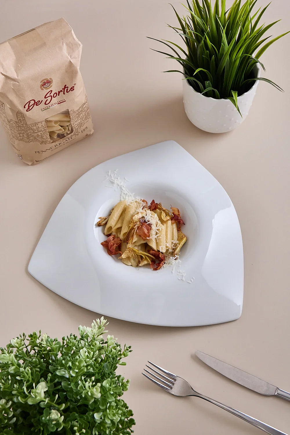 Penne ai carciofi con pecorino lucano e pancetta