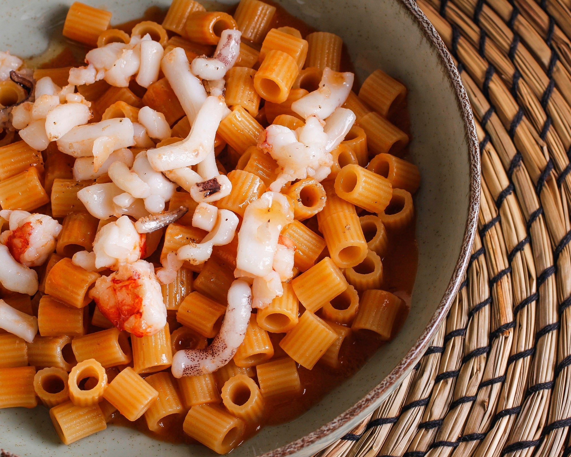 Ditali risotto in seafood stew with prawns and cuttlefish 