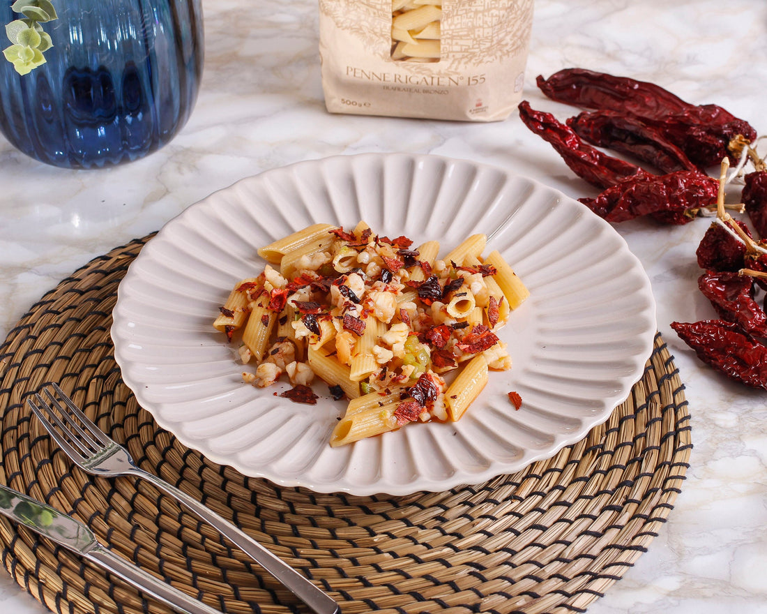Penne al ragù di gamberi con briciole di peperone crusco