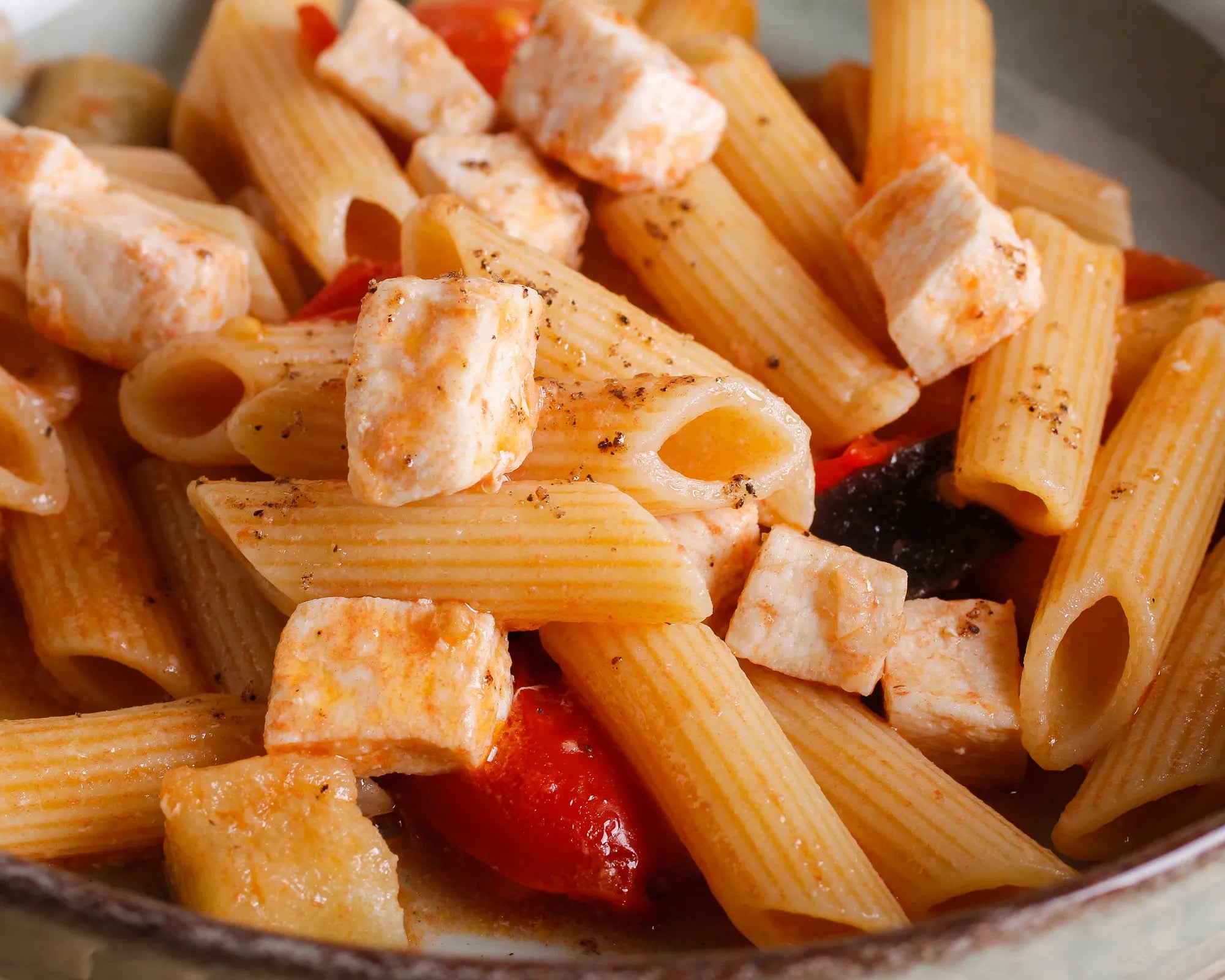 Penne with swordfish, cherry tomatoes and aubergines 