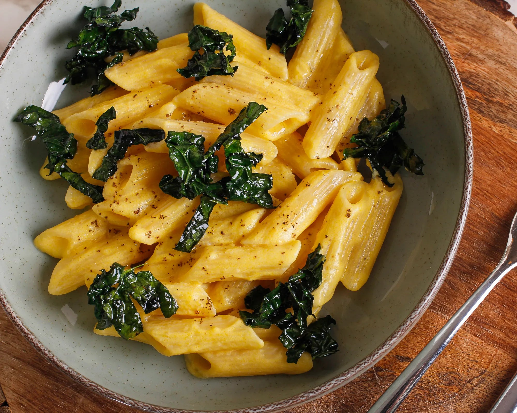 Penne with julienned black cabbage and mascarpone pumpkin cream 