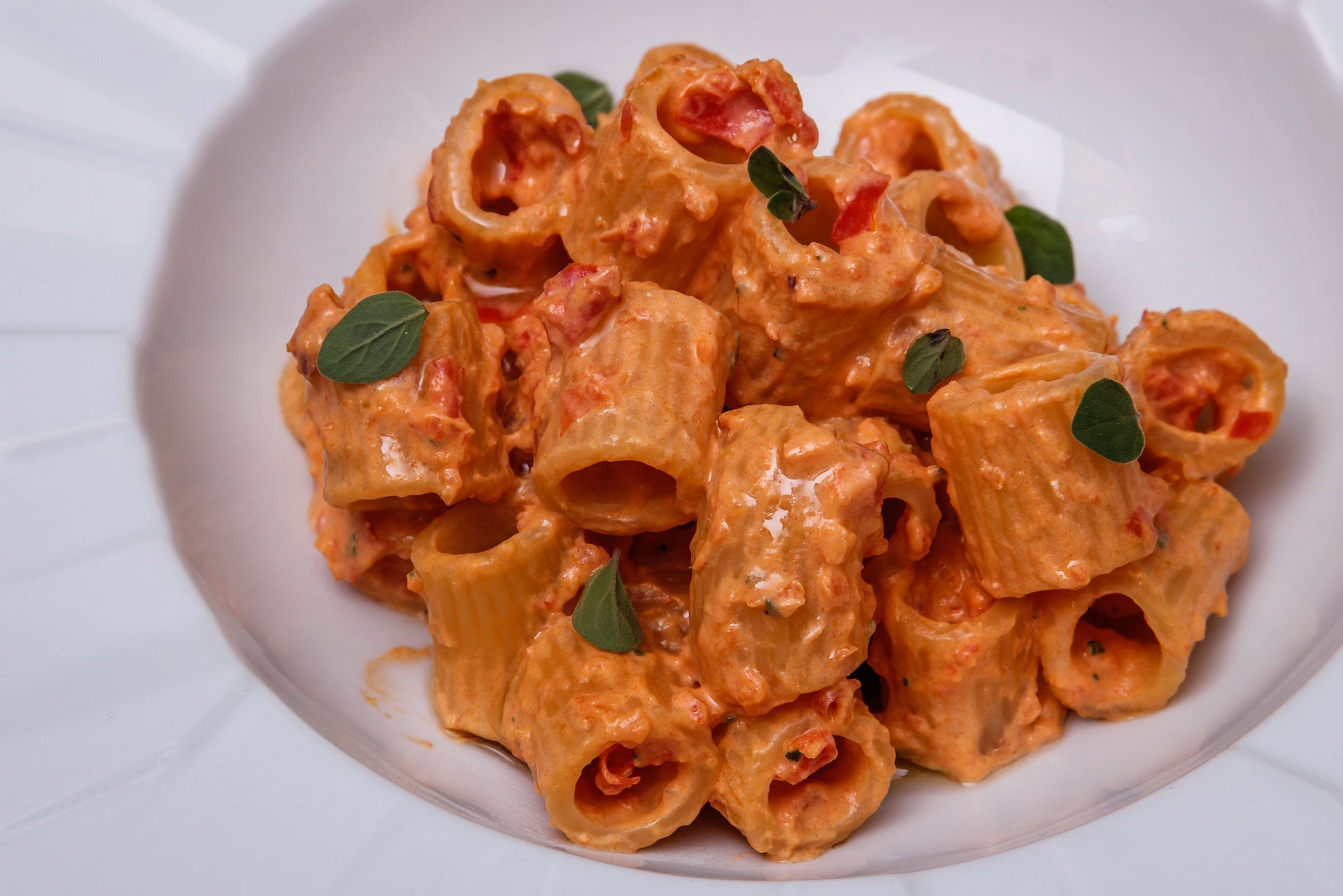 Mezze maniche with Calabrian pesto: fresh tomatoes, red peppers, and ricotta 