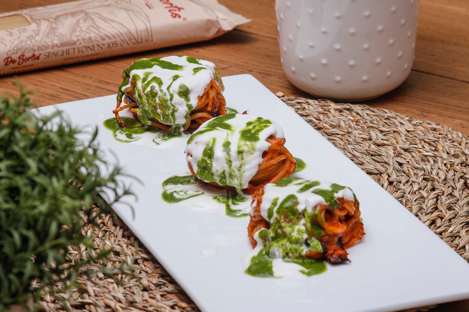 Spaghetti alla Norma with salted ricotta fondue and basil drops 