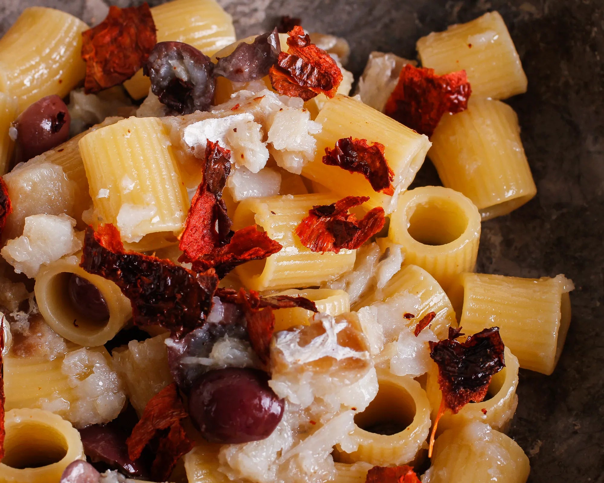 Mezze maniche with cod, black olives and crusco peppers 